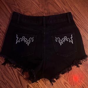 black jean shorts, xs but run big